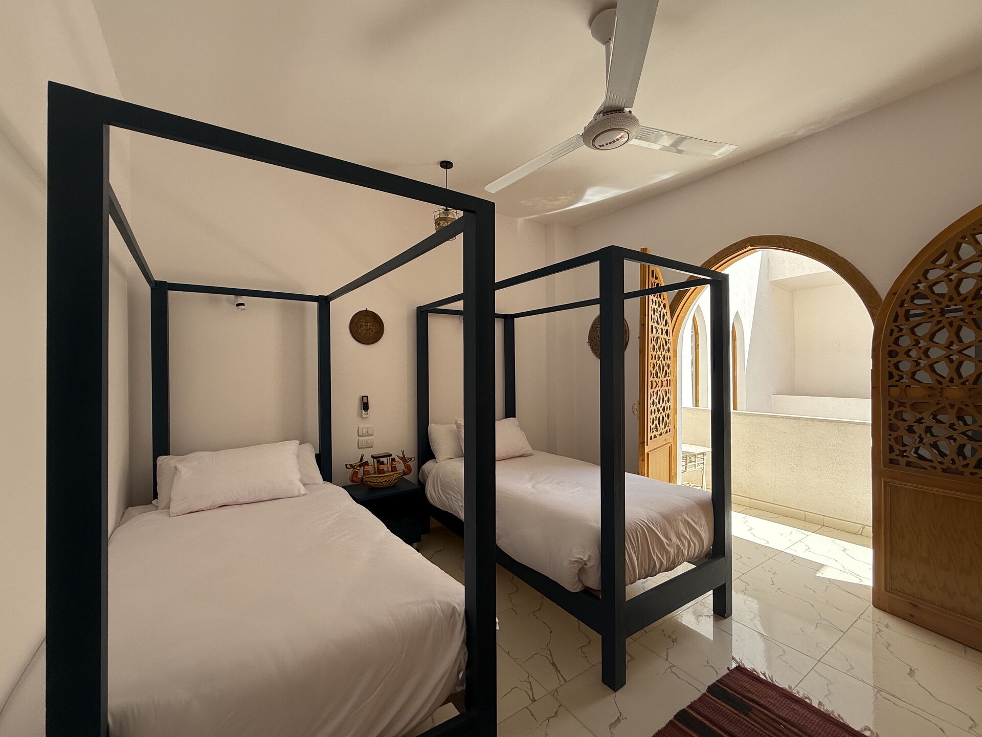 Deluxe Twin Room with Two Single Four Poster Beds, Courtyard and Nile Views